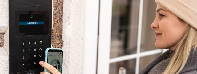 Homeowner using a smart home touchpad