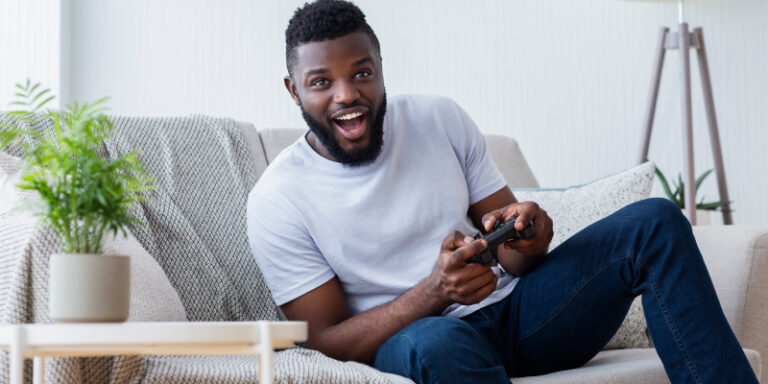 Cox panoramic wi fi male playing console 01