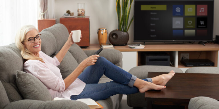 Frontier tv and internet senior women watching tv 01