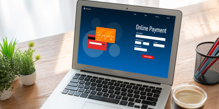 Online payment gateways for business owners laptop on table 01