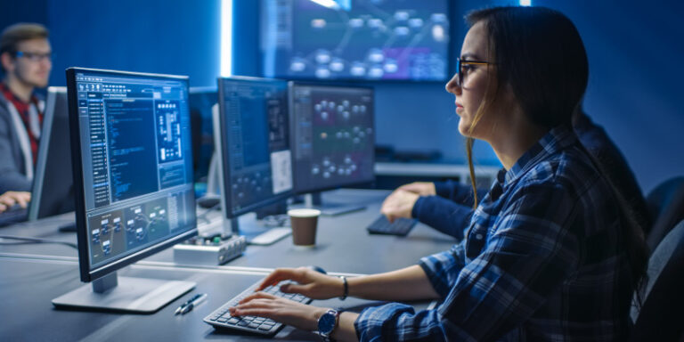 Essential ai tools female using computer 01