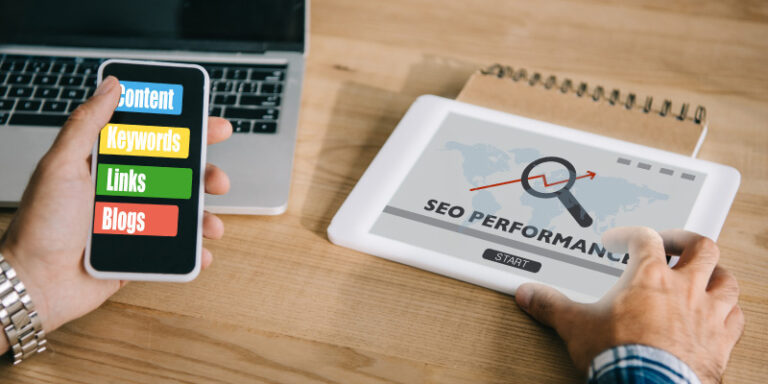 How seo boosts sales and enhances online visibility person using phone 01