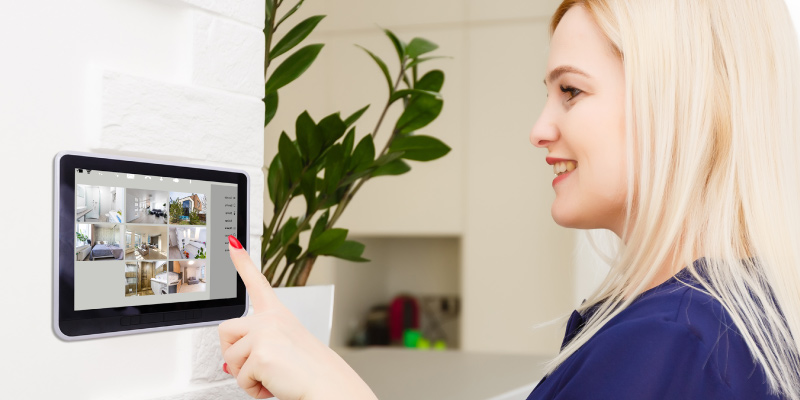Power of smart home security services female touch pad 01