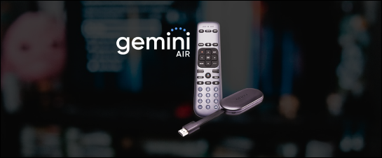 A close up of a remote control with a logo in the background.