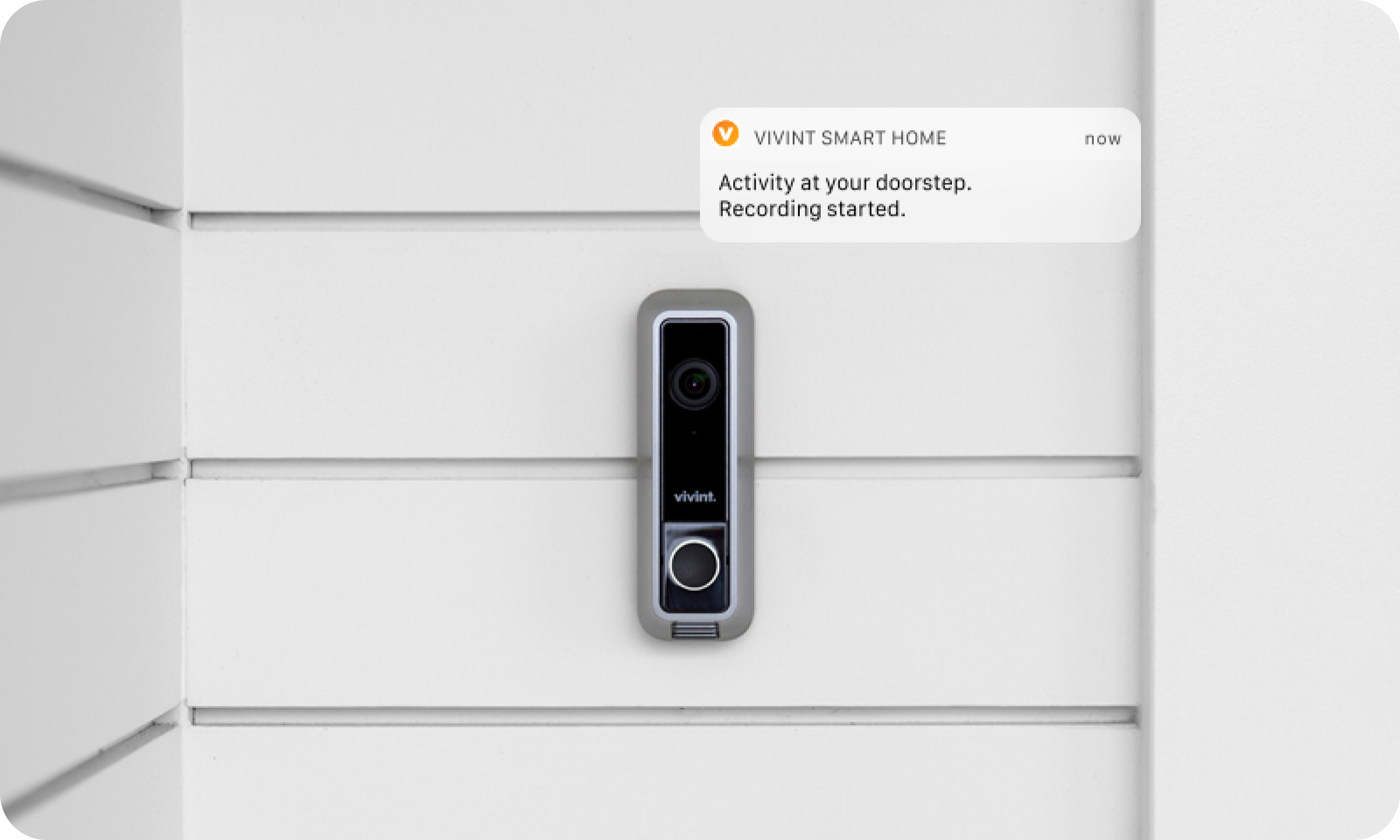 A smart phone is attached to a wall.